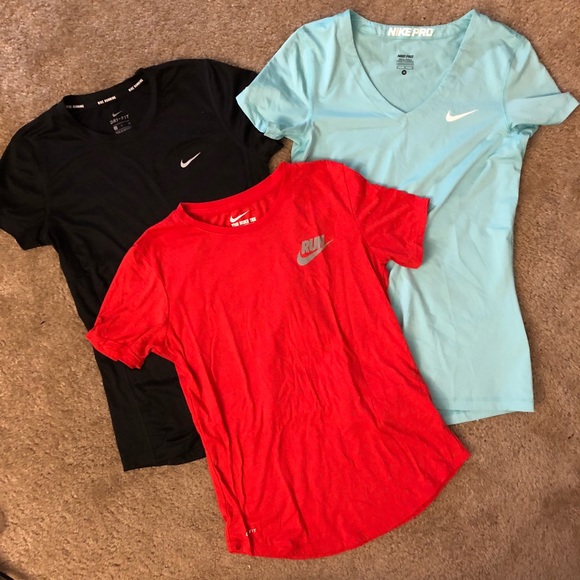 light blue and red nike shirt